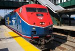 AMTK 108 leading train 290 in perfect light.